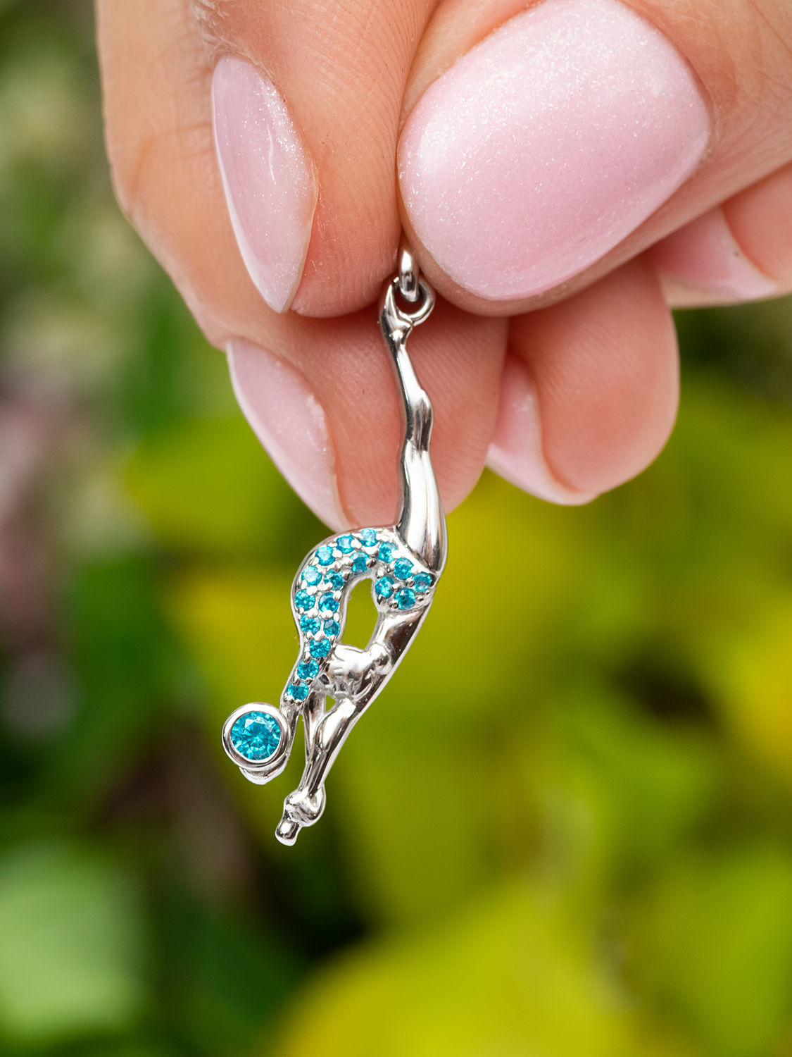 Pendentif en argent avec pierres précieuses "Champion"